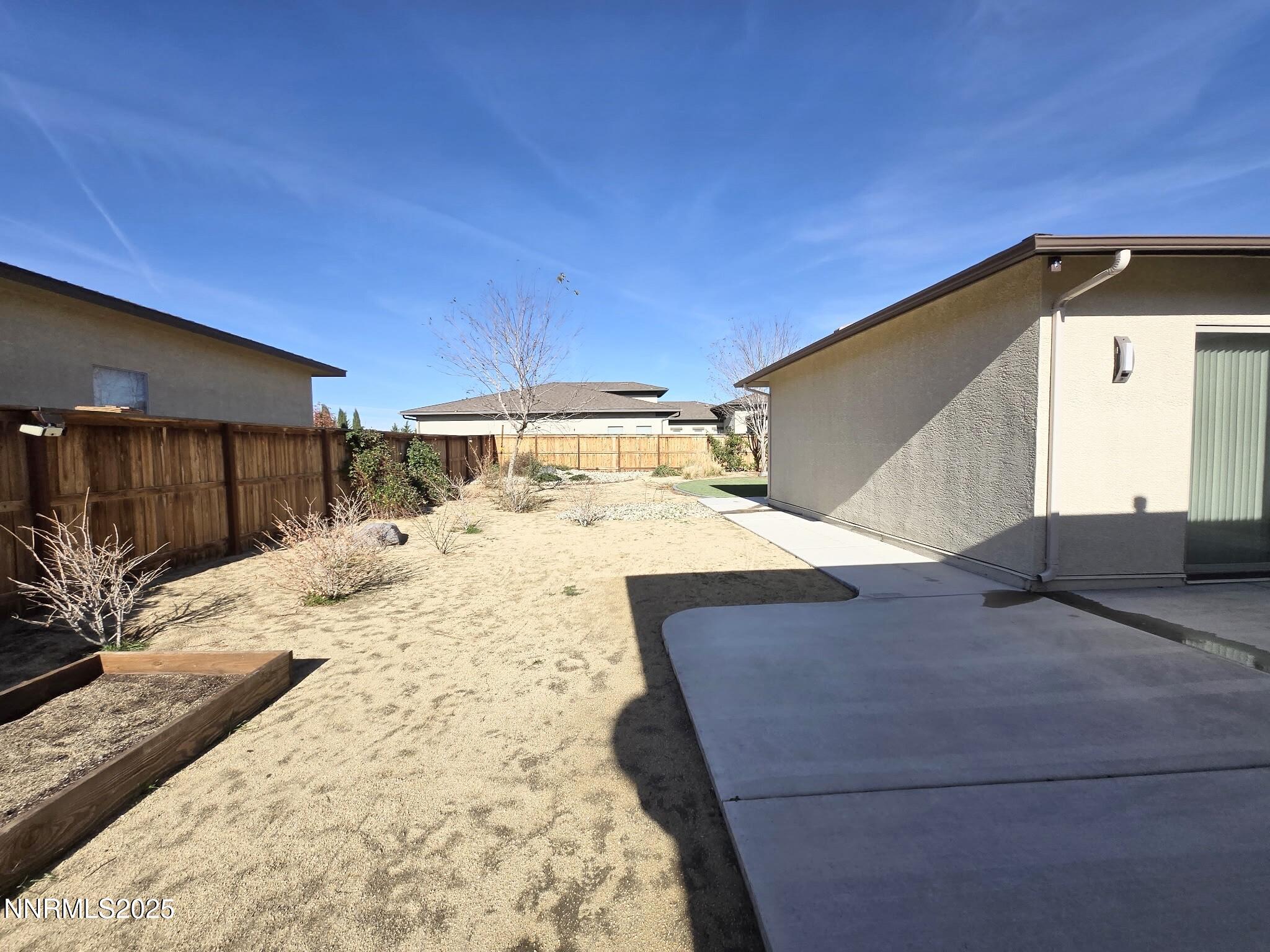 162 Jennys Lane Fernley, NV 89408 - Photo 27 of 39 a view of a backyard of the house