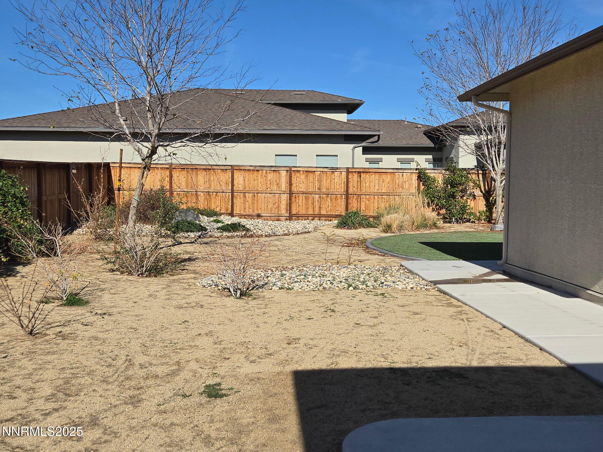 162 Jennys Lane Fernley, NV 89408 - Photo 29 of 39 a view of a backyard of a house