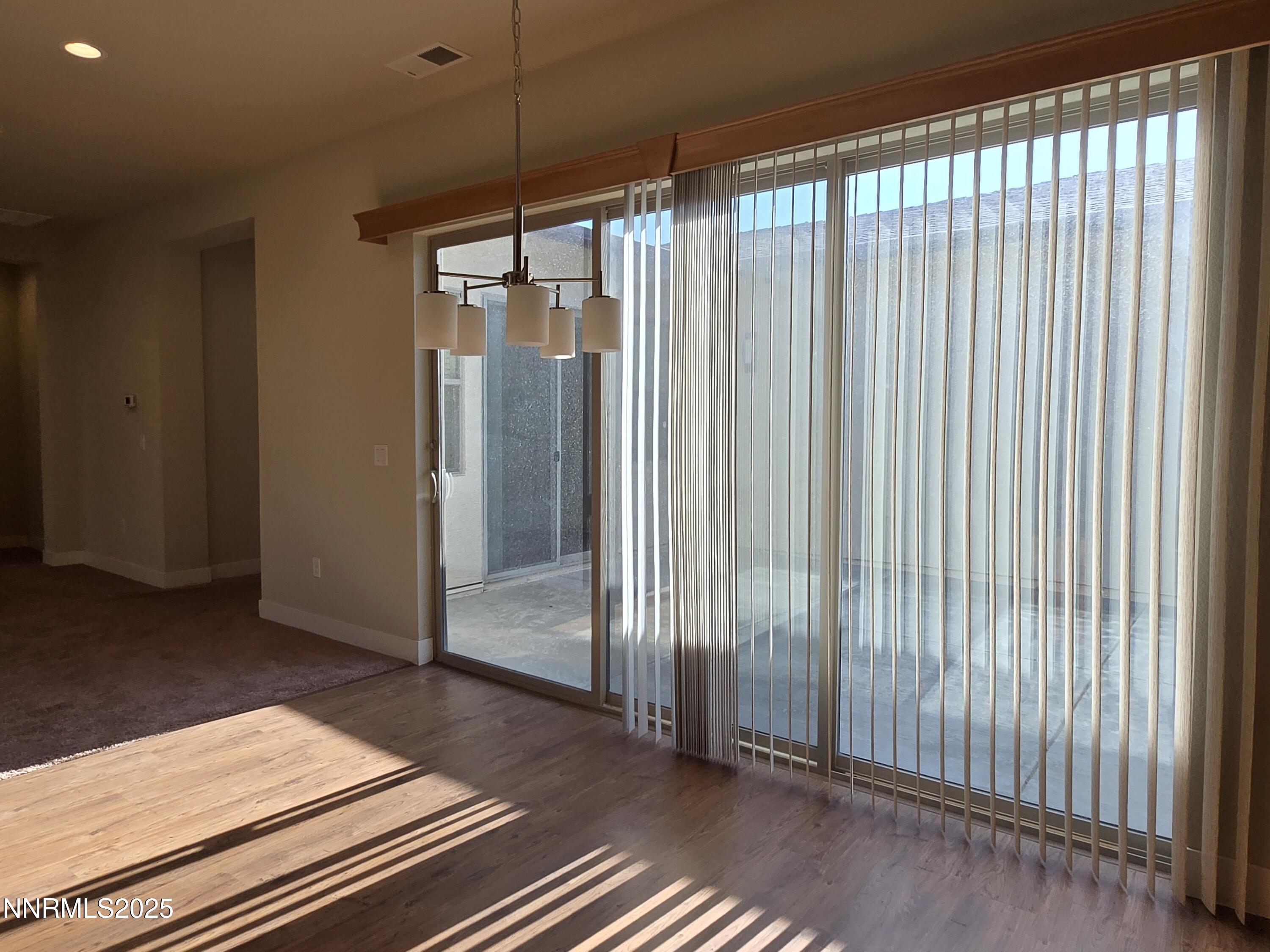 162 Jennys Lane Fernley, NV 89408 - Photo 10 of 39 a view of a balcony with wooden floor