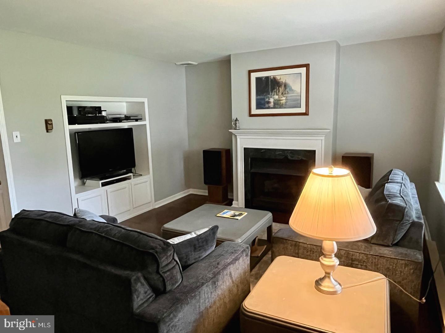 306 Media Line Road Newtown Square, PA 19073 - Photo 14 of 41 a living room with furniture and a fireplace