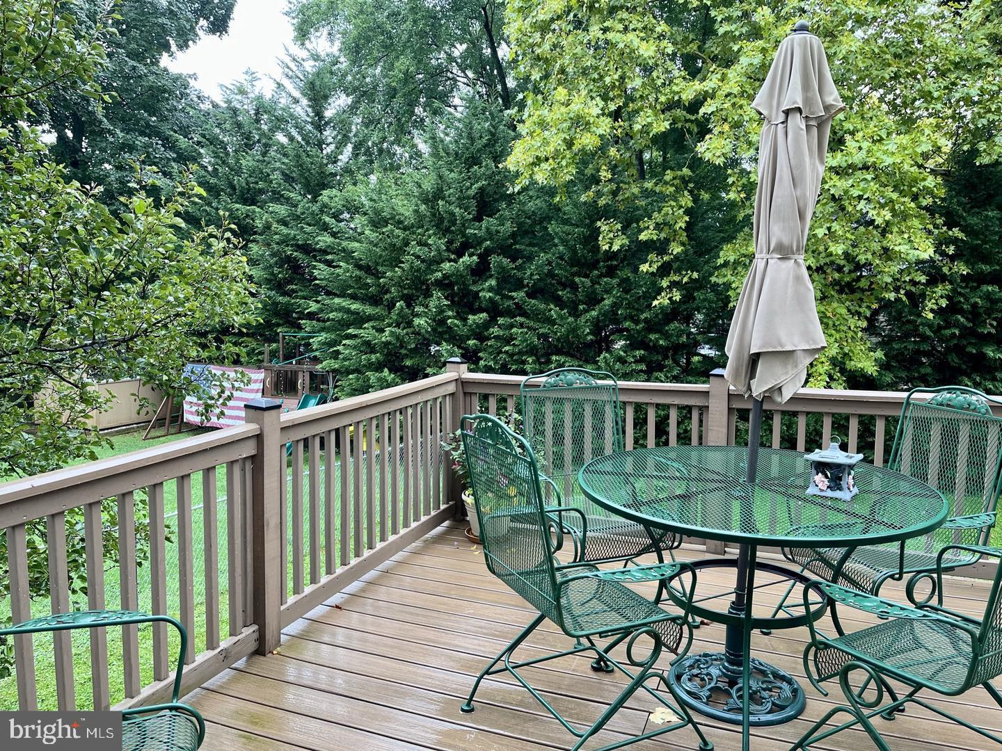 306 Media Line Road Newtown Square, PA 19073 - Photo 20 of 41 a view of a wooden chairs and table in the balcony