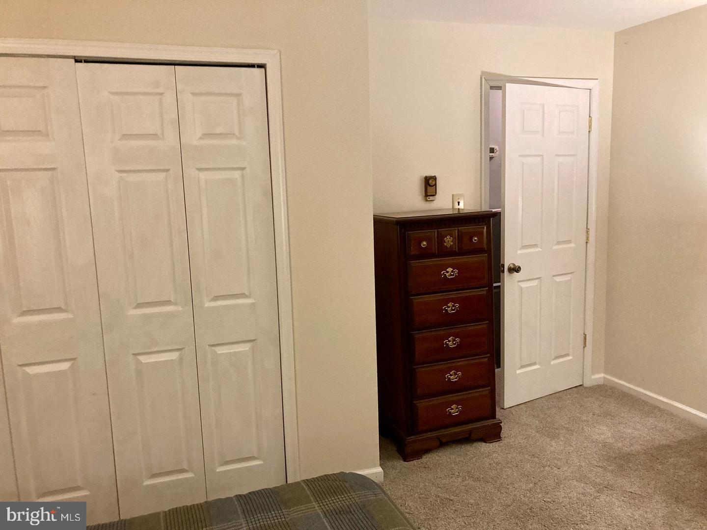 306 Media Line Road Newtown Square, PA 19073 - Photo 31 of 41 a view of a bedroom with a wooden closet