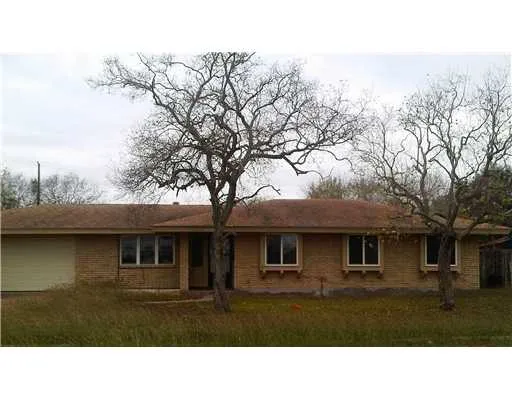 a black and white photo of a house