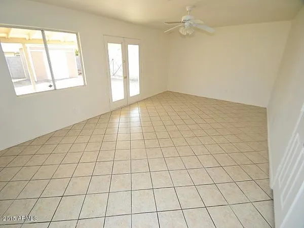 a view of empty room with windows