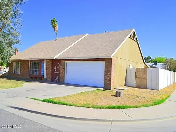a front view of house with garage