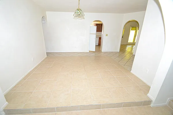 a view of livingroom with kitchen