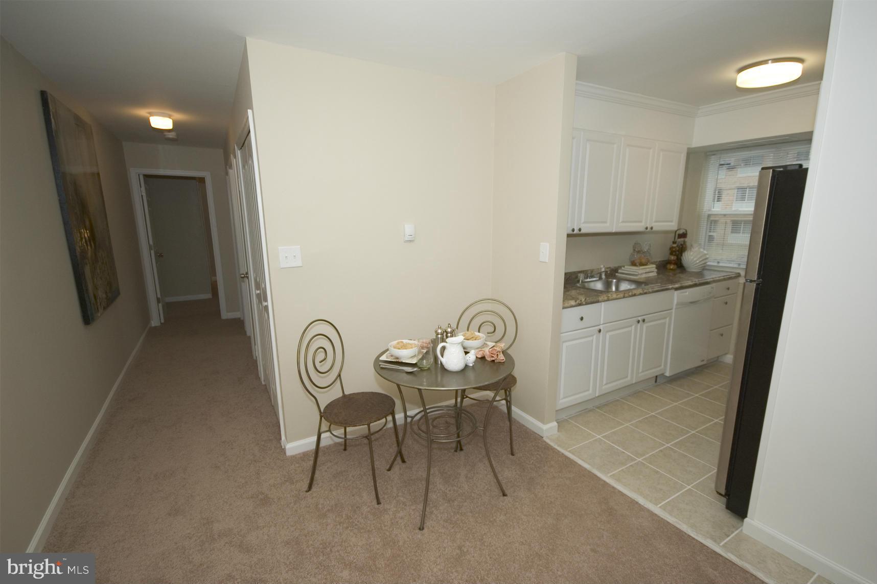 2351 16th Street Southeast, Unit 302 Washington, DC 20020 - Photo 12 of 27 a dining room with furniture and window