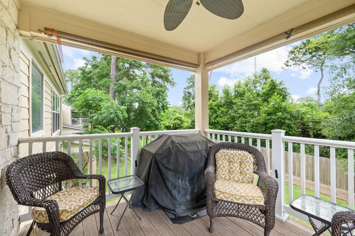 13600 Breton Ridge Street, Unit 25E Houston, TX 77070 - Photo 31 of 39 a balcony view with a large window and sitting space