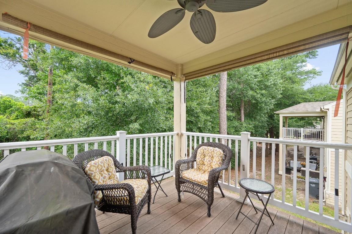 13600 Breton Ridge Street, Unit 25E Houston, TX 77070 - Photo 32 of 39 a view of a two chairs in the deck
