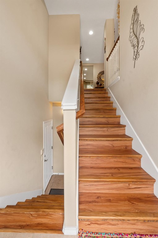 13600 Breton Ridge Street, Unit 25E Houston, TX 77070 - Photo 4 of 39 a view of entryway and hall with wooden floor