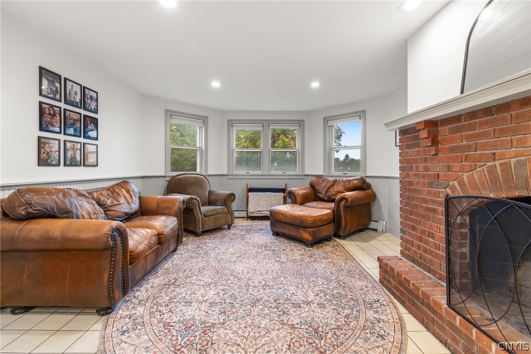 2971 Amber Road Marcellus, NY 13110 - Photo 15 of 50 Enjoy cold nights in front of the brick wood-burni