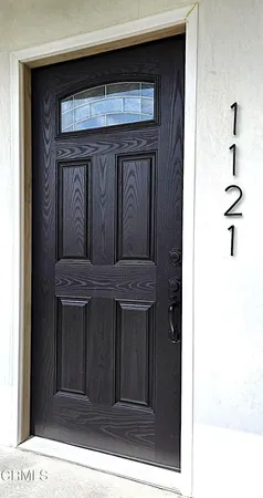 a spacious bathroom with a double vanity sink and a large mirror