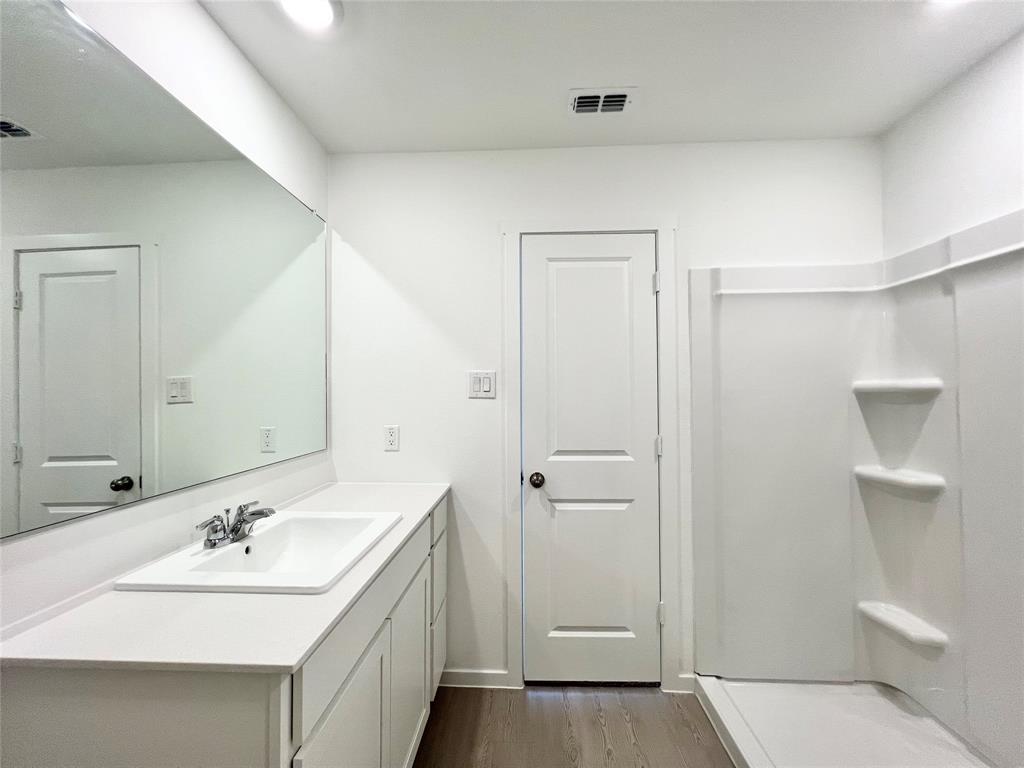 4012 Twinleaf Drive Crowley, TX 76036 - Photo 20 of 39 a bathroom with a sink a toilet and shower