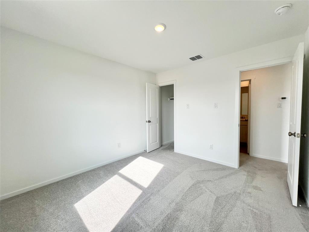 4012 Twinleaf Drive Crowley, TX 76036 - Photo 27 of 39 an empty room with an entryway