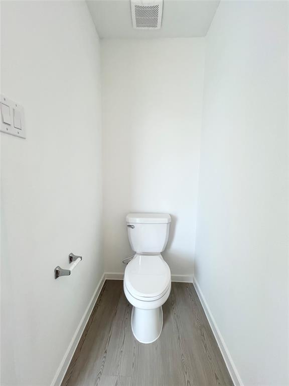 4012 Twinleaf Drive Crowley, TX 76036 - Photo 5 of 39 a white toilet sitting in a bathroom