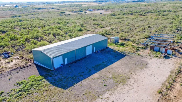 a view of a terrace with a yard