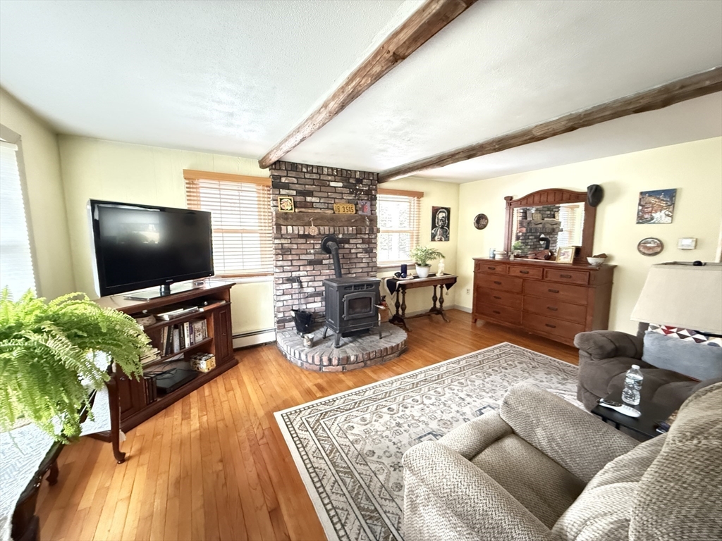 1 Anna Street Ware, MA 01082 - Photo 12 of 26 a living room with furniture and a flat screen tv