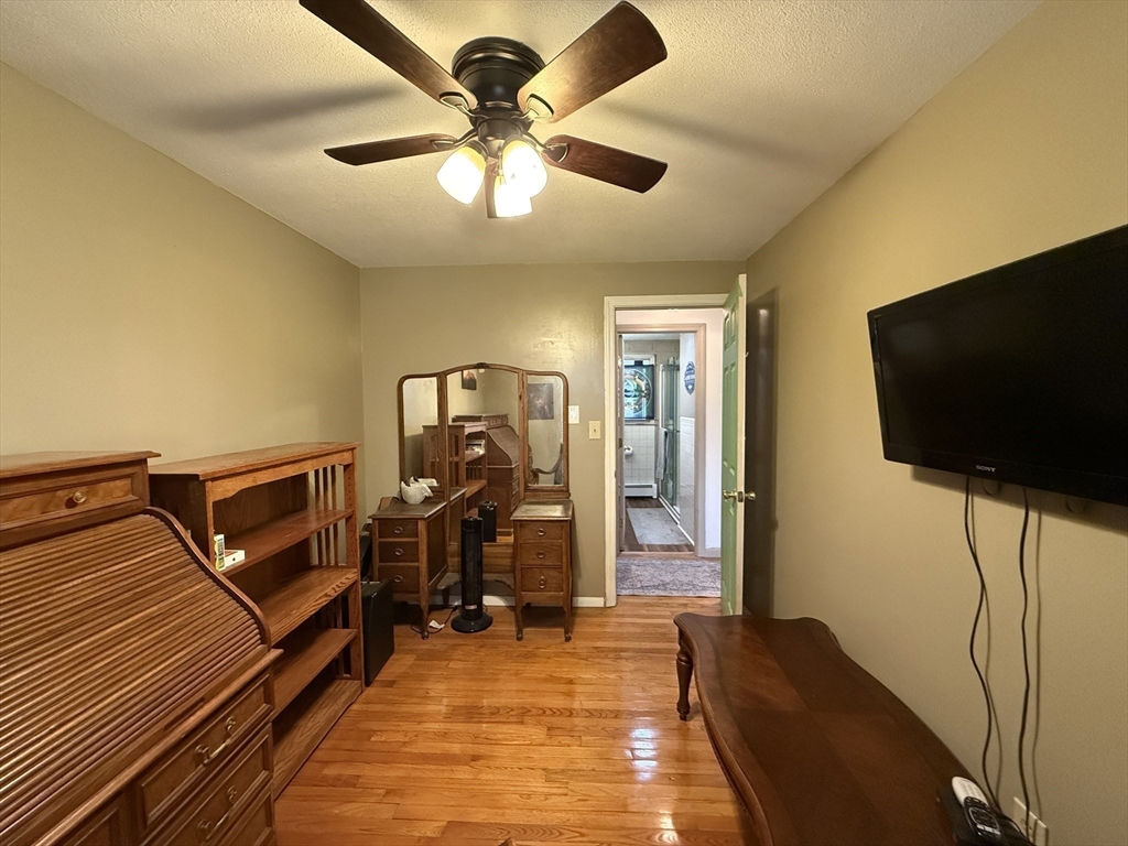 1 Anna Street Ware, MA 01082 - Photo 18 of 26 a view of a livingroom with furniture and a flat screen tv