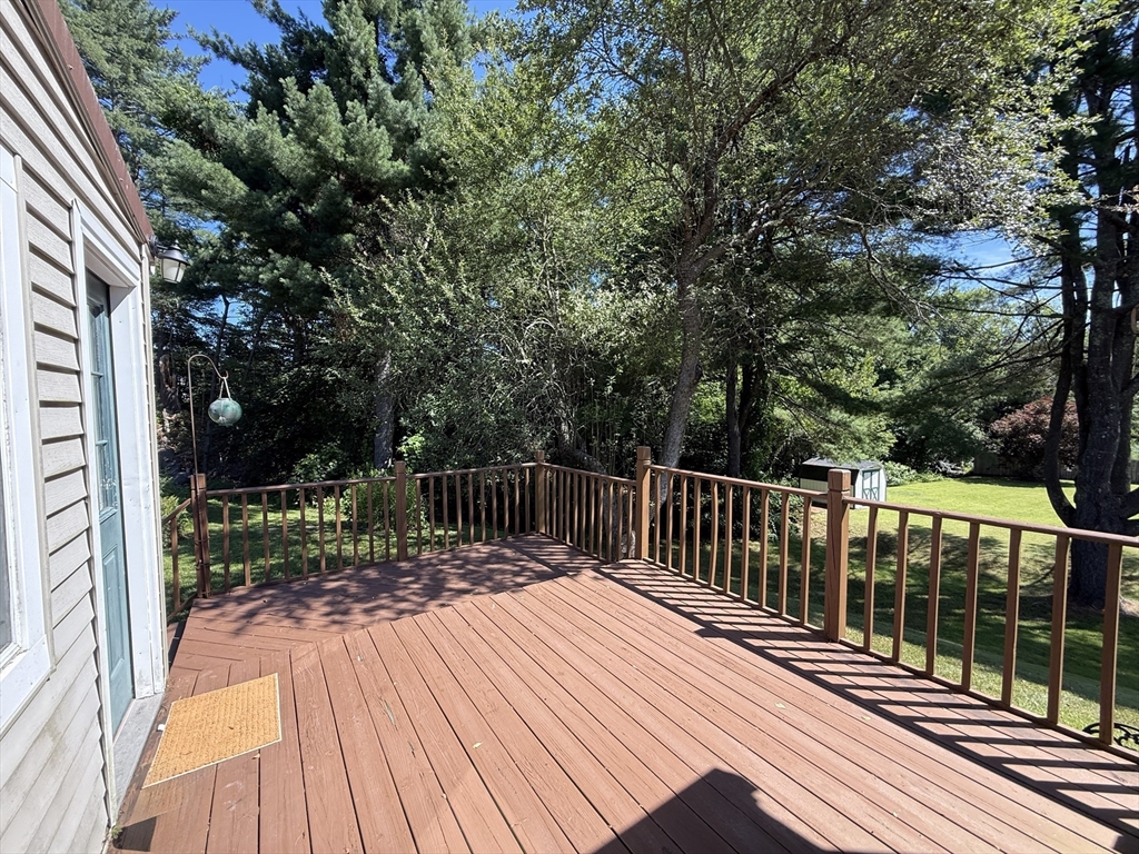 1 Anna Street Ware, MA 01082 - Photo 4 of 26 a view of balcony with wooden floor and fence