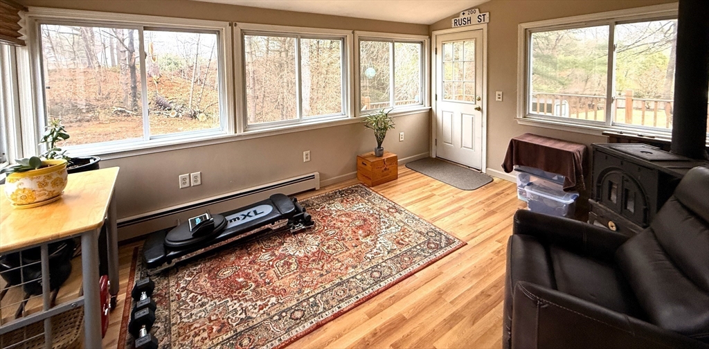 1 Anna Street Ware, MA 01082 - Photo 10 of 26 a living room with hard wood floors and a window
