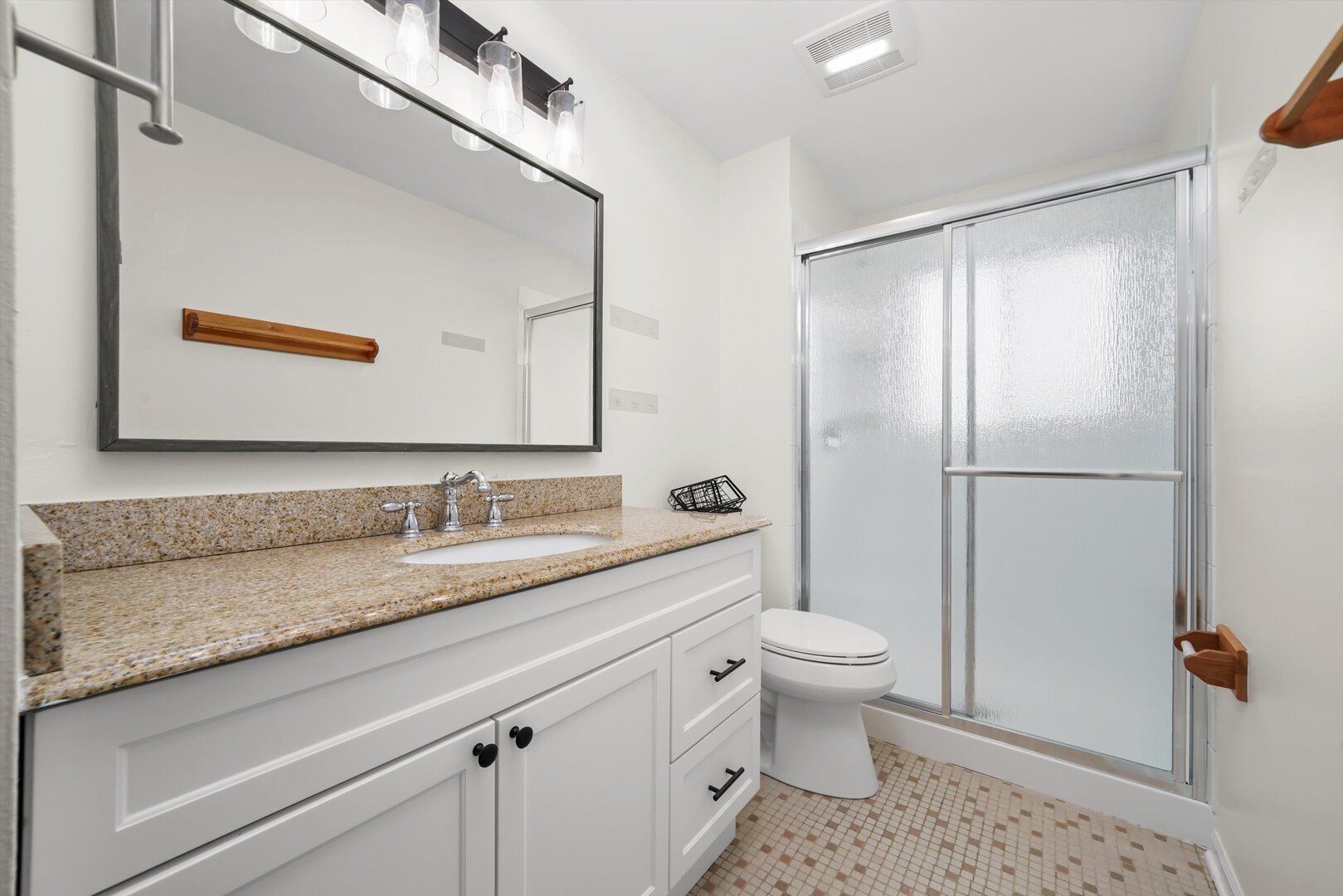 1100 Stoughton Court, Unit 1711 Schaumburg, IL 60193 - Photo 6 of 20 a bathroom with a granite countertop sink toilet and shower