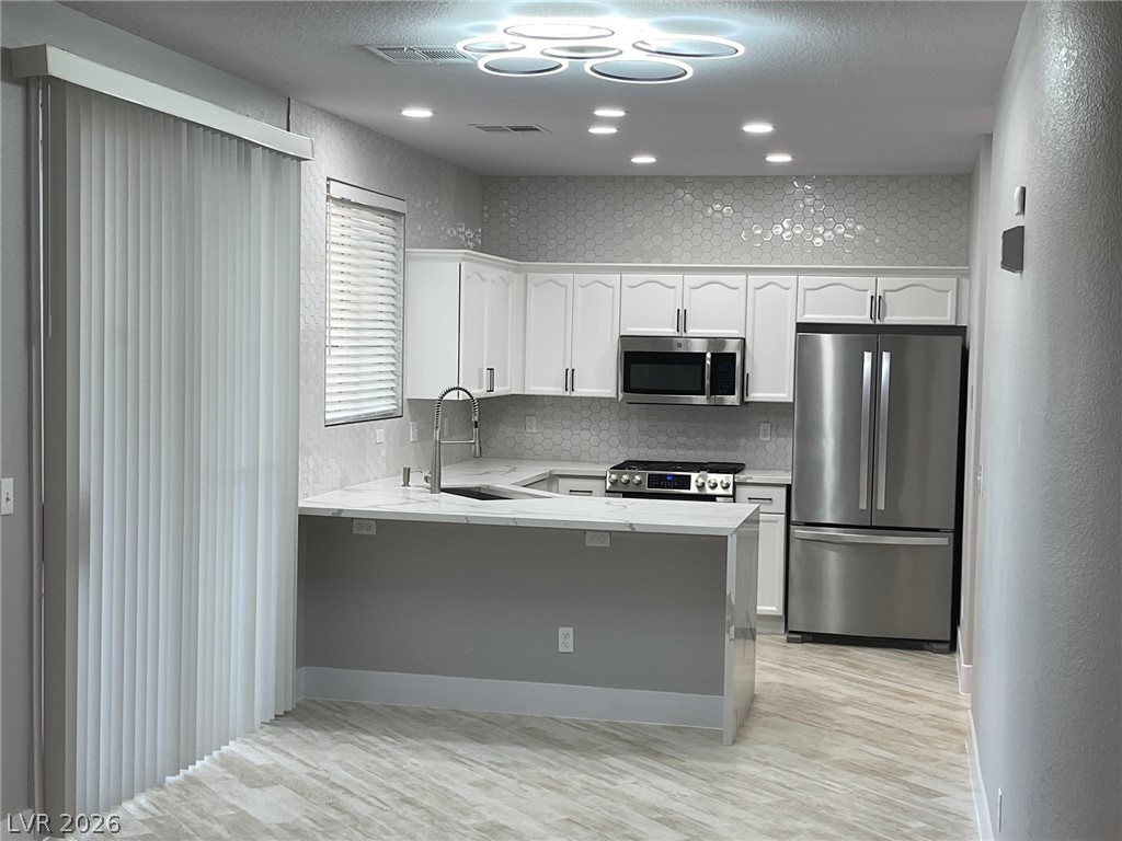 1194 Stormy Valley Road Las Vegas, NV 89123 - Photo 2 of 31 KITCHEN