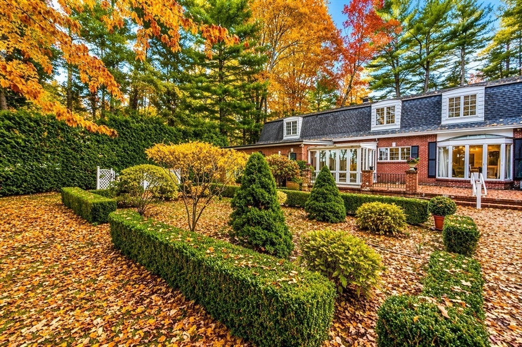 12 Woodland Road Westfield, MA 01085 - Photo 3 of 29 a view of a house with a yard and garden