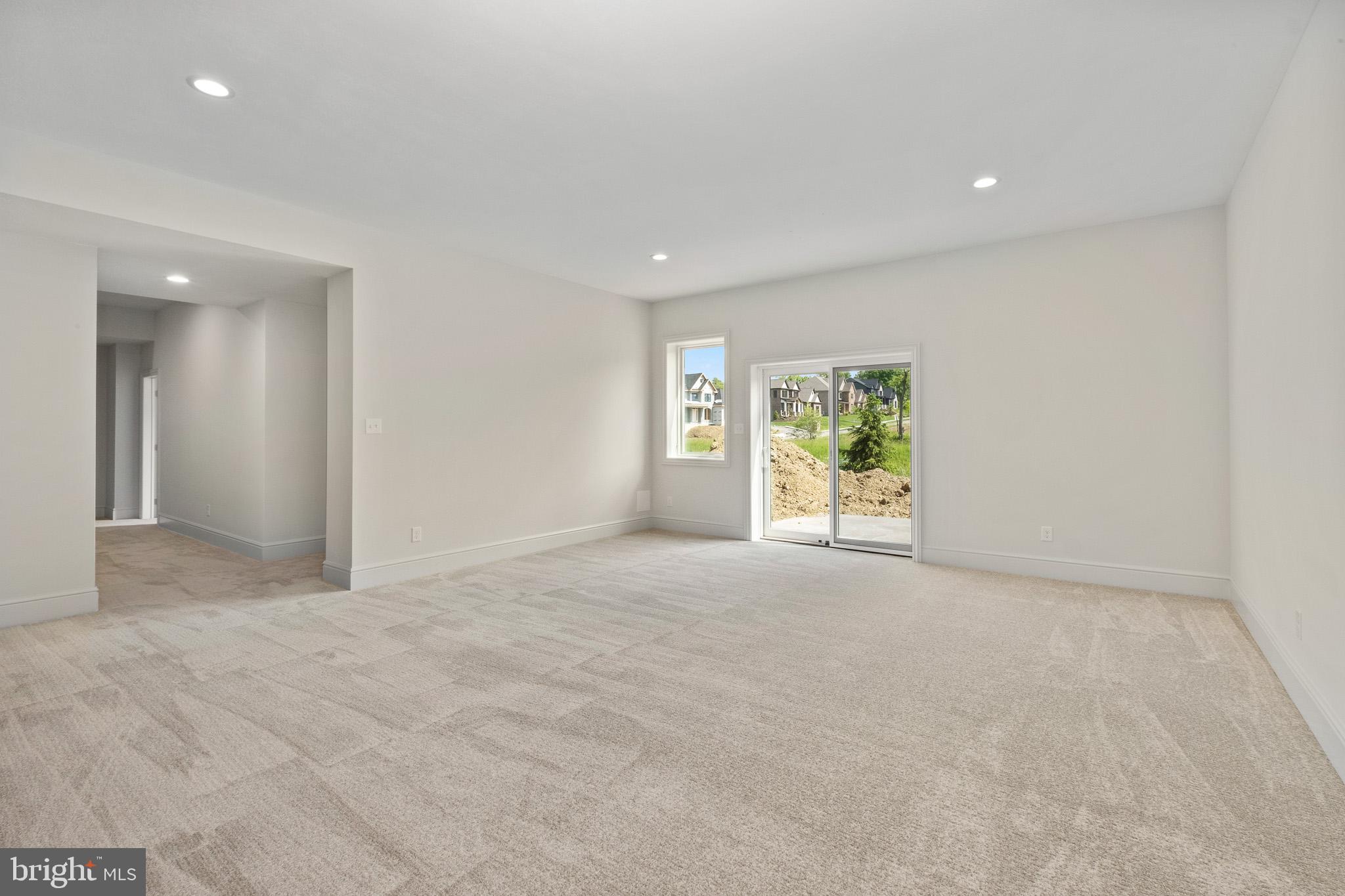 510 Newcomen Road, Unit R1D Exton, PA 19341 - Photo 41 of 51 a view of a livingroom with an empty space and a window