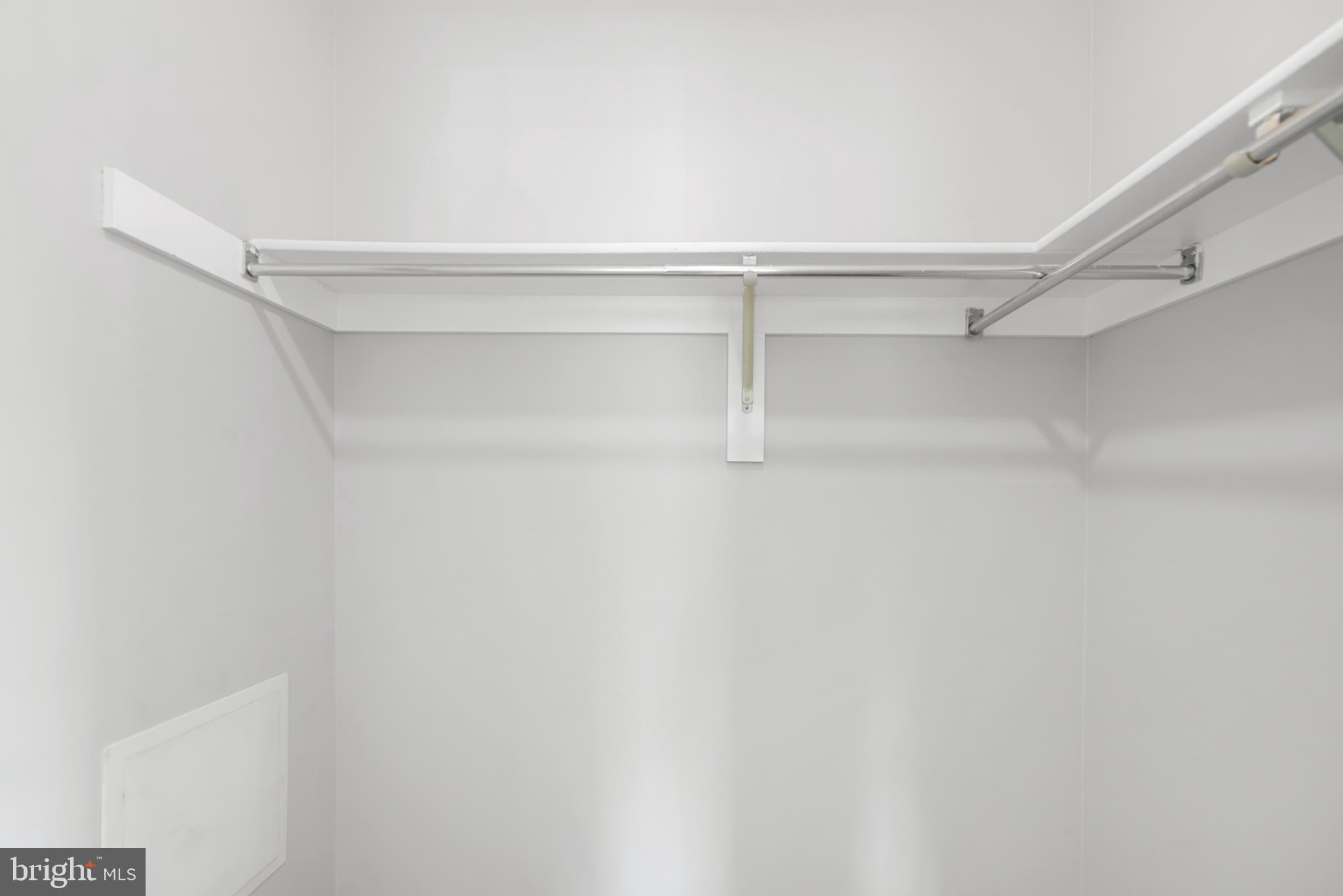 7826 Harrowgate Circle, Unit D Springfield, VA 22152 - Photo 16 of 21 a view of an empty walk in closet