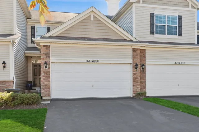 a view of a house with a garage