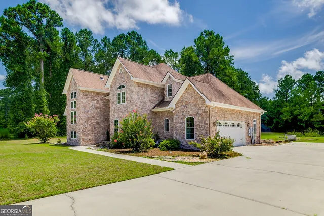 front view of house with a yard