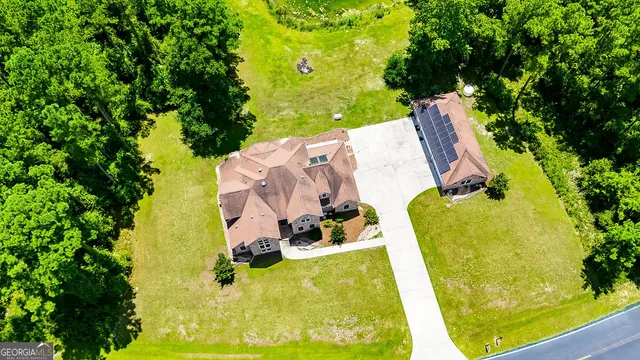 an aerial view of a swimming pool