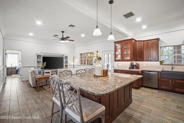 a room with furniture and a flat screen tv