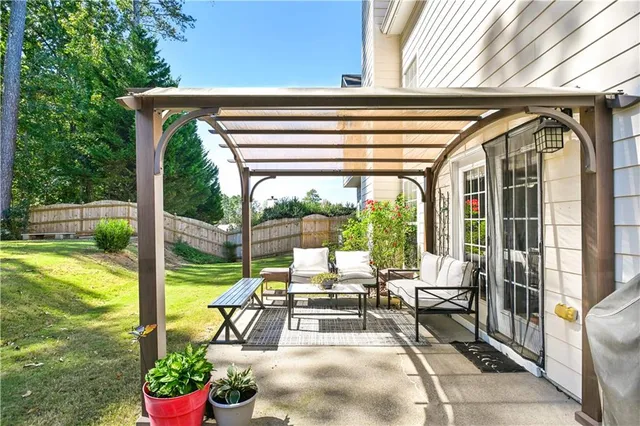 a view of living room with furniture and garden