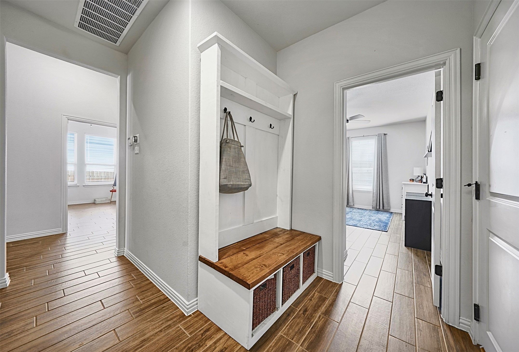 903 Simmental Loop Hutto, TX 78634 - Photo 12 of 26 Built-in bench with hooks and storage for organization