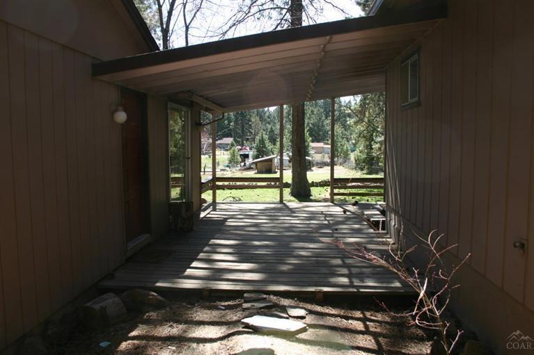 19129 Pumice Butte Road Bend, OR 97702 - Photo 3 of 18 a view of outdoor space with deck