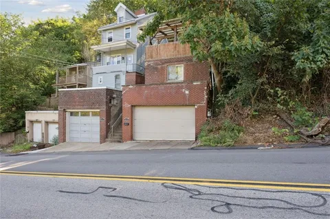 front view of a house with a street