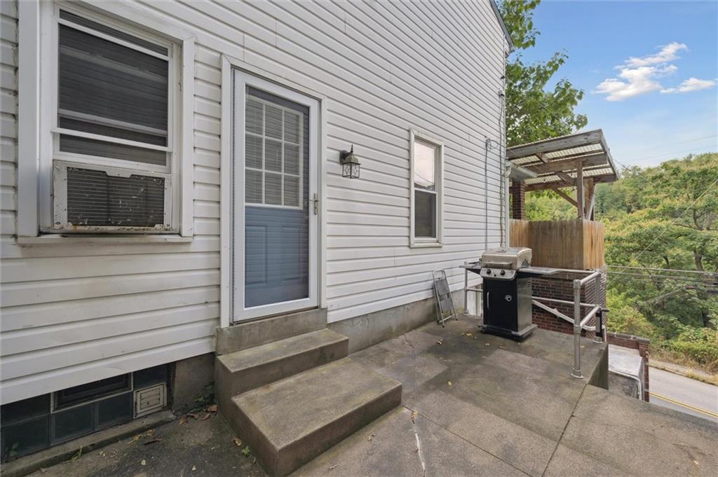 679 Greentree Road Pittsburgh, PA 15220 - Photo 4 of 25 a backyard of a house with outdoor seating