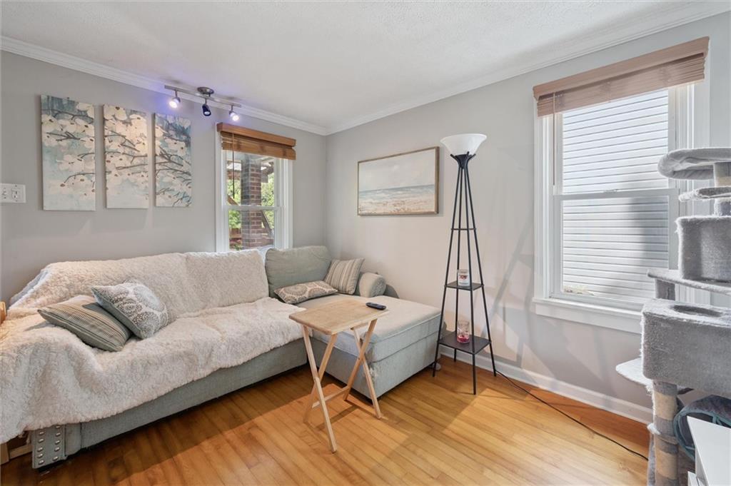679 Greentree Road Pittsburgh, PA 15220 - Photo 6 of 25 a living room with furniture and a window