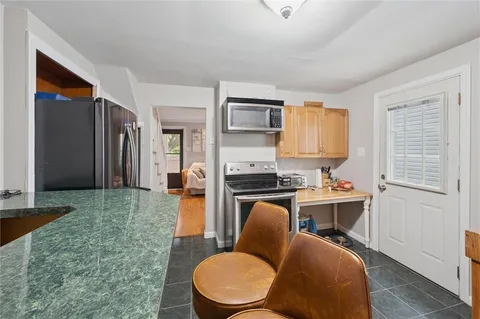 a workspace with furniture and window