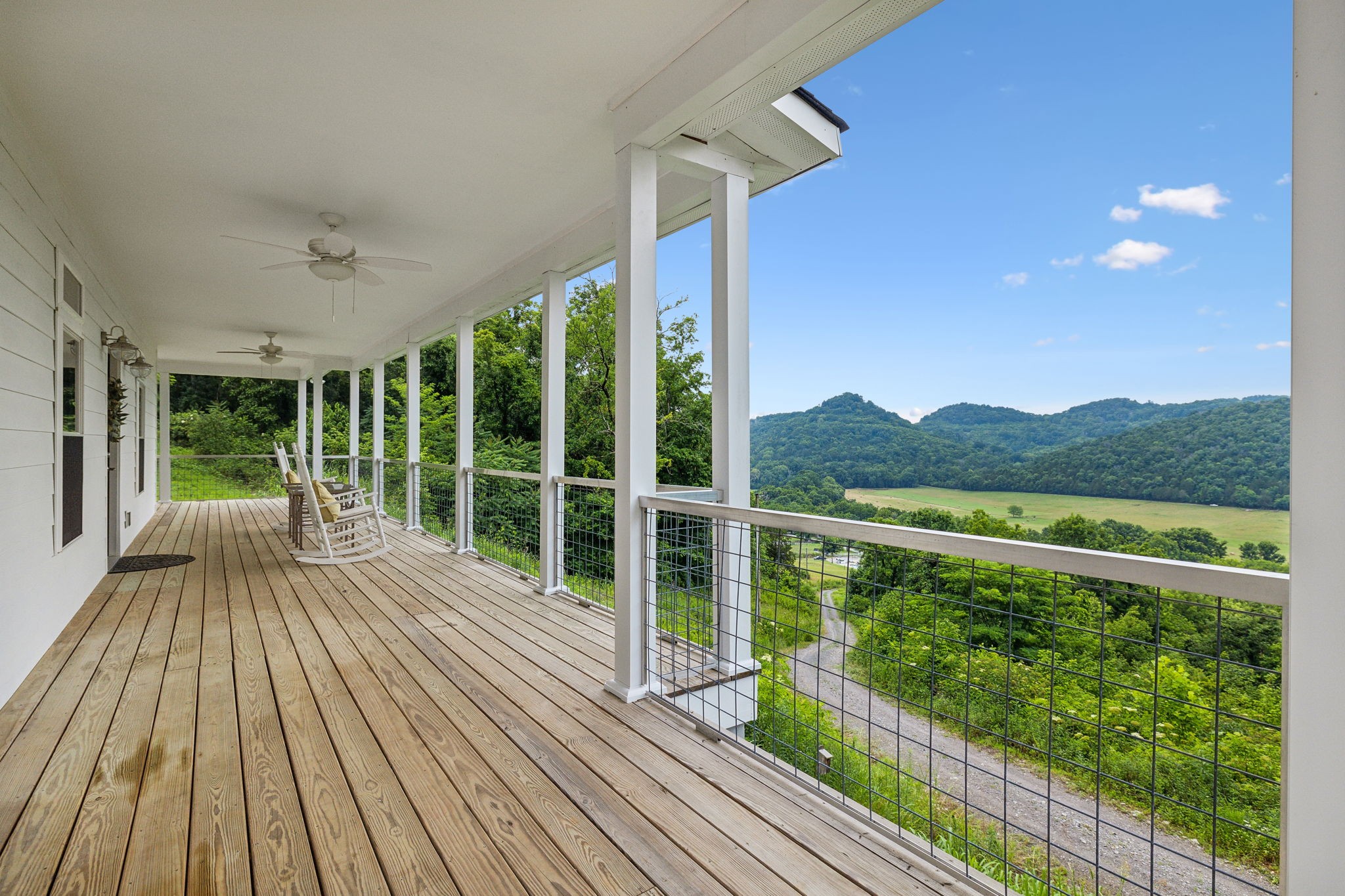 172 Peytons Creek Road Carthage, TN 37030 - Photo 54 of 60 a view of balcony with wooden floor and fence