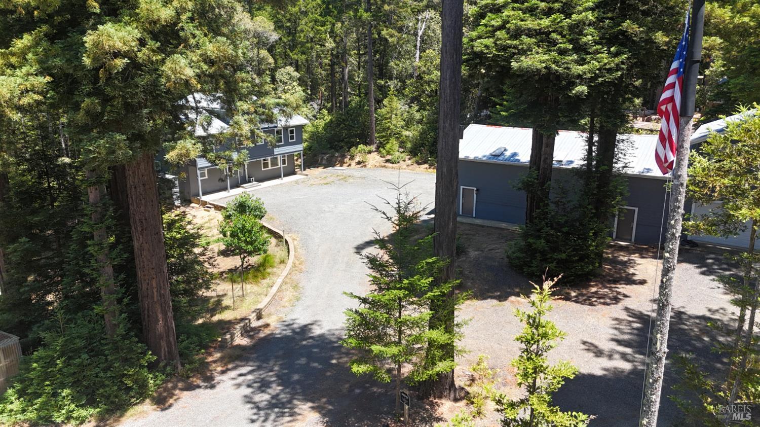 44000 Iversen Road Gualala, CA 95445 - Photo 41 of 57 Old glory, redwoods, and a beautiful coastal home. Dont miss out on this dream compound.