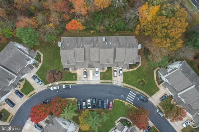 an aerial view of a house with outdoor space