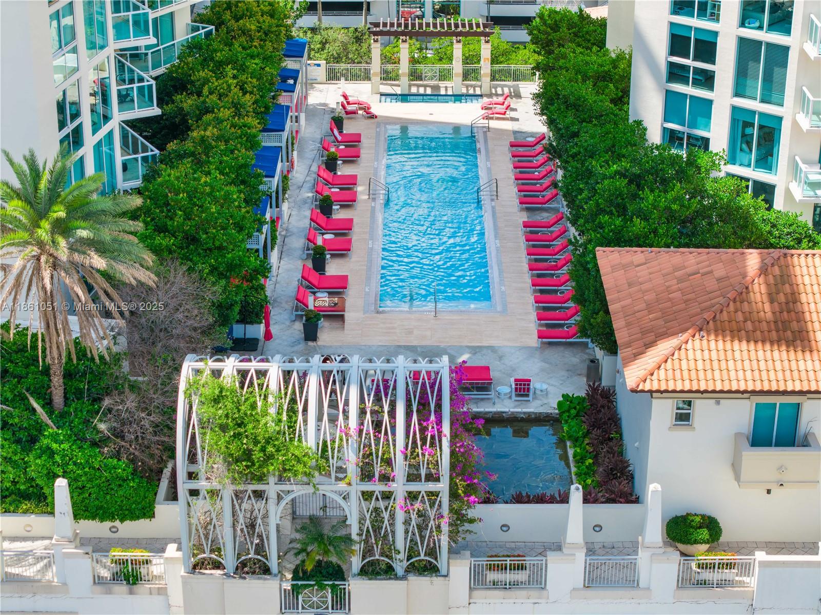 250 Sunny Isles Boulevard, Unit 31202 Sunny Isles Beach, FL 33160 - Photo 20 of 28 a aerial view of multi story residential apartment building