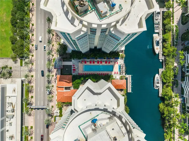 a view of a balcony with chairs
