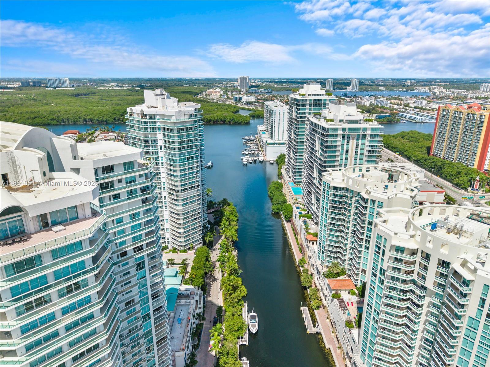 250 Sunny Isles Boulevard, Unit 31202 Sunny Isles Beach, FL 33160 - Photo 27 of 28 a view of a city with tall buildings