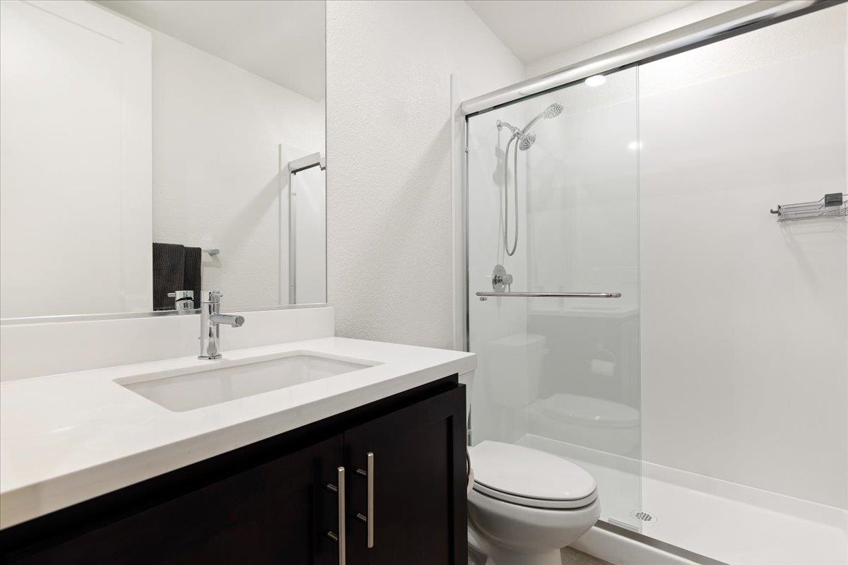 2005 Davoli Court San Ramon, CA 94583 - Photo 16 of 45 Downstairs Bathroom with vanity, and shower stall