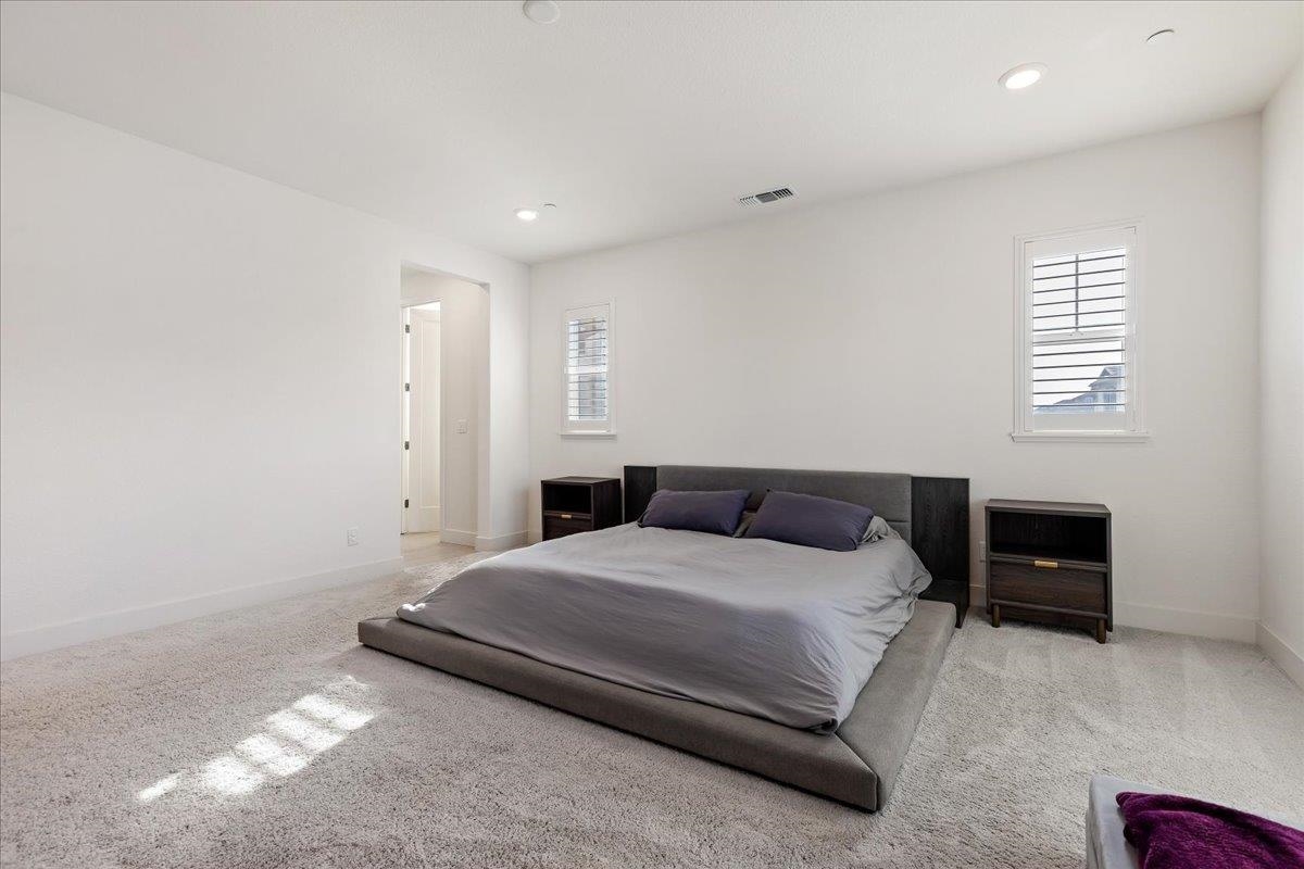 2005 Davoli Court San Ramon, CA 94583 - Photo 20 of 45 Primary Bedroom with light colored carpet and recessed lighting