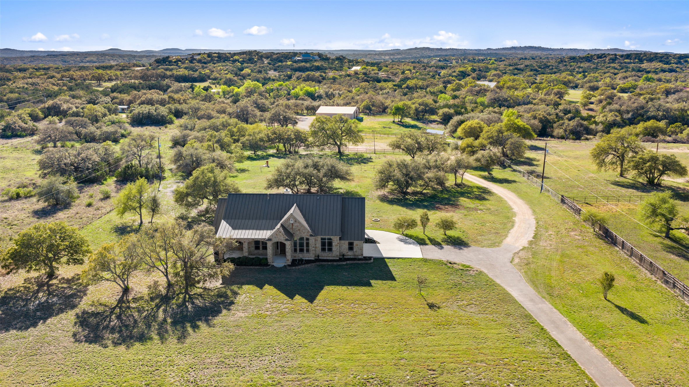 118 Landons Way Blanco, TX 78606 - Photo 17 of 32 a view of a swimming pool with a lake