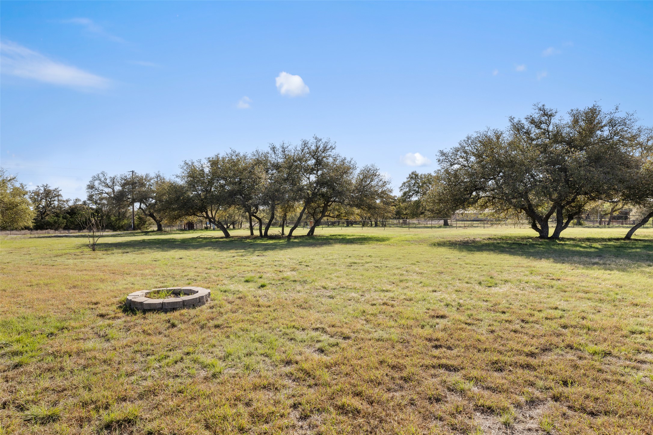 118 Landons Way Blanco, TX 78606 - Photo 23 of 32 a view of a lake with a yard